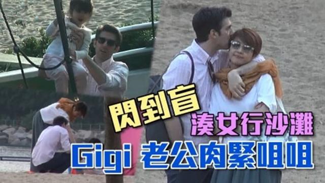 帶女兒去沙灘玩也要恩愛一番 老公當眾輕吻梁詠琪2次