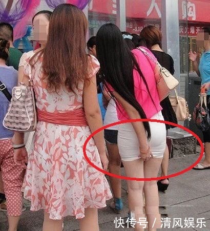 搞笑GIF圖：妹子妳當街整理自己的短裙，看錯的人還以為妳要幹什麼！