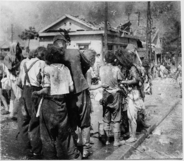 原子彈轟炸後100年之內不能住人，為什麼廣島長崎還能住那麼多人？